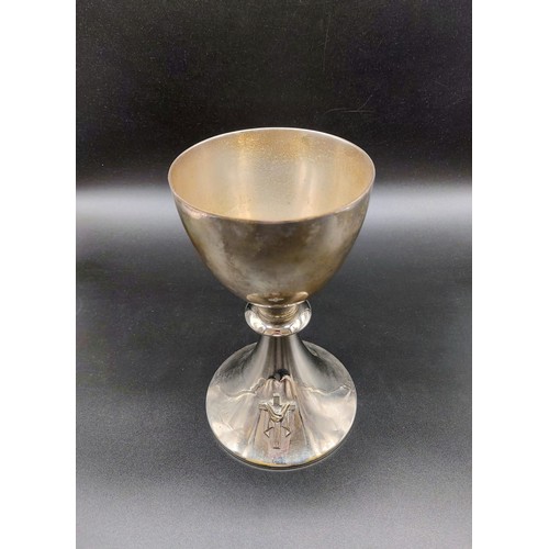 370 - An Early White Metal Chalice with a Silver Cross.
20cm tall. 10cm diameter at mouth. 595g