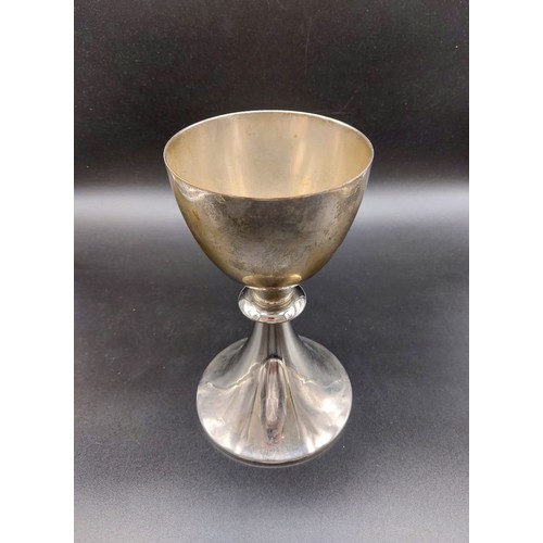 370 - An Early White Metal Chalice with a Silver Cross.
20cm tall. 10cm diameter at mouth. 595g