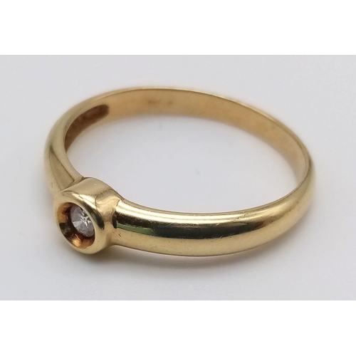 739 - A 14K Yellow Gold Diamond Solitaire Ring. Size R.
2.45g