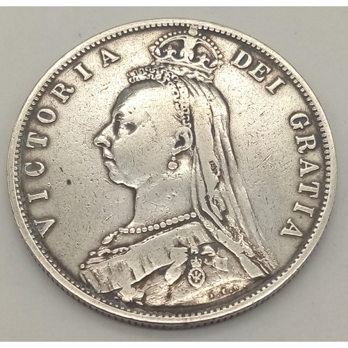 120 - An 1887 Queen Victoria Silver Half Crown - Jubilee Head. Very fine condition but please see photos. ... 