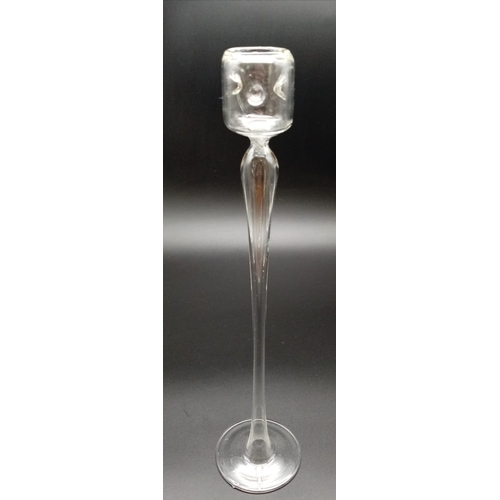 729 - A HAND BLOWN DESIGNER SINGLE CANDLE HOLDER.  30cms in height.