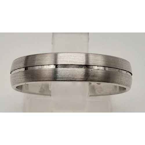 1195 - A 14 K white gold pair of rings. One wedding  band, ring size O and one half eternity diamond ring, ... 