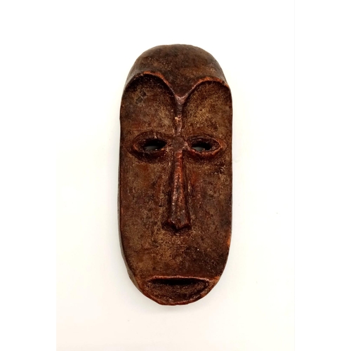 747 - A 19th Century, carved ivory, mask from Lega tribe, Congo. Dimensions: 12.5 x 6 x 3 cm, weight: 141 ... 