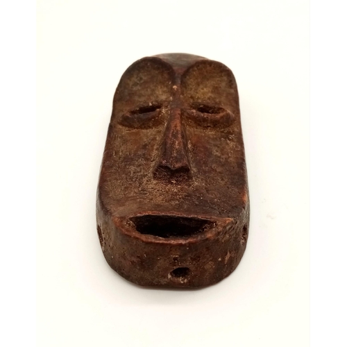 747 - A 19th Century, carved ivory, mask from Lega tribe, Congo. Dimensions: 12.5 x 6 x 3 cm, weight: 141 ... 