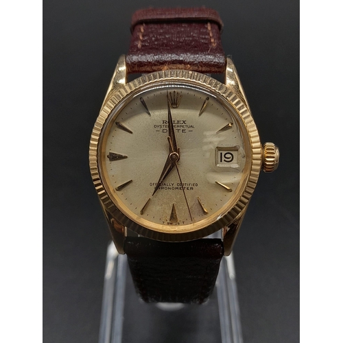 13 - A Rare Rose-Gold Rolex Oyster Perpetual Unisex Watch.
Brown leather strap. 18K Gold Case - 31mm. Gol... 