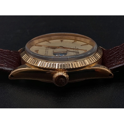 13 - A Rare Rose-Gold Rolex Oyster Perpetual Unisex Watch.
Brown leather strap. 18K Gold Case - 31mm. Gol... 