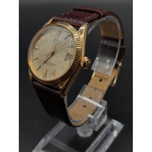 13 - A Rare Rose-Gold Rolex Oyster Perpetual Unisex Watch.
Brown leather strap. 18K Gold Case - 31mm. Gol... 