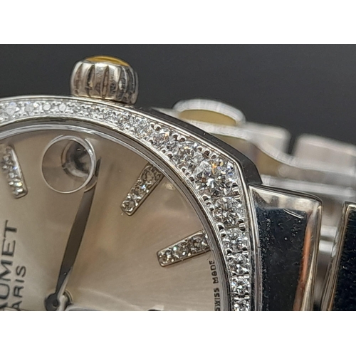 76 - An 18K White Gold Chaumet Ladies Watch. Gold and diamond bracelet and case - 28mm. Silver tone dial.... 