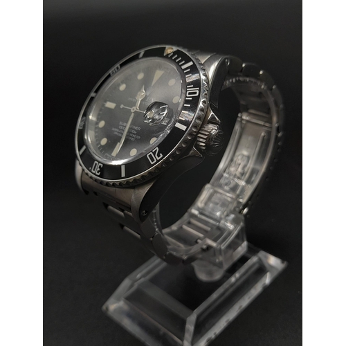 38 - A Rolex Submariner Gents Watch. Stainless steel strap and case - 40mm. Black dial and date window. A... 