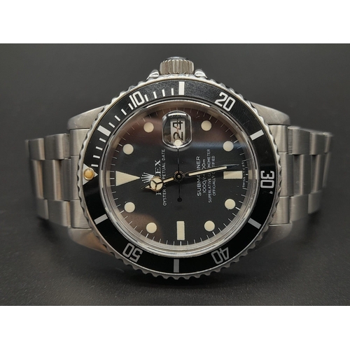 38 - A Rolex Submariner Gents Watch. Stainless steel strap and case - 40mm. Black dial and date window. A... 