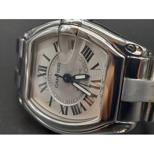 69 - A Cartier Roadster Gents Watch. Stainless steel strap and case - 40mm. Two tone silver and white dia... 