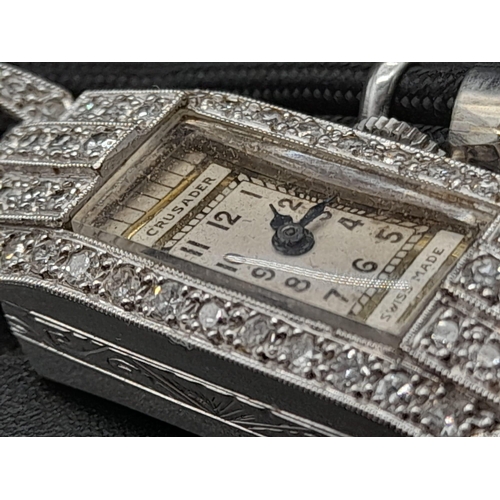 97 - An Antique (1920s) Art Deco Crusader Platinum and Diamond Ladies Watch. Platinum and diamond case. 1... 