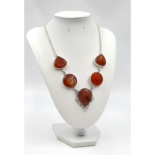 765 - A White Metal Red Agate Drop Pendant Necklace. 
44cm.