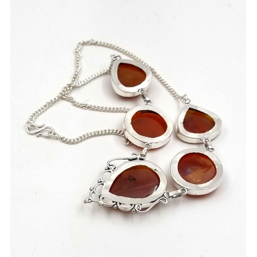 765 - A White Metal Red Agate Drop Pendant Necklace. 
44cm.