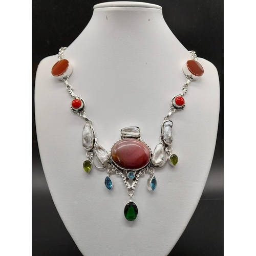 752 - An Agate, Red Coral, Pearls, Tourmaline and Peridot Drop Pendant Necklace. 44cm