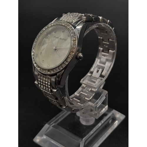 1187 - A LADIES DIAMONTE DRESS WATCH BY RIVER ISLAND WITH MOTHER OF PEARL FACE