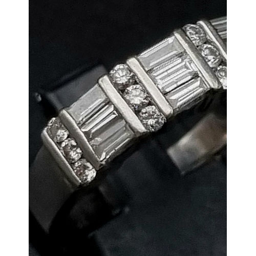 18 - 14k white gold diamond mix cut 3 row band ring, 1.10ct of diamonds, rings size P, total weight 5.2 g... 