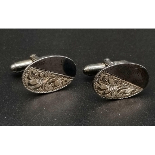 66 - A quality, British, sterling silver, hand engraved pair of cufflinks in original presentation box.  ... 