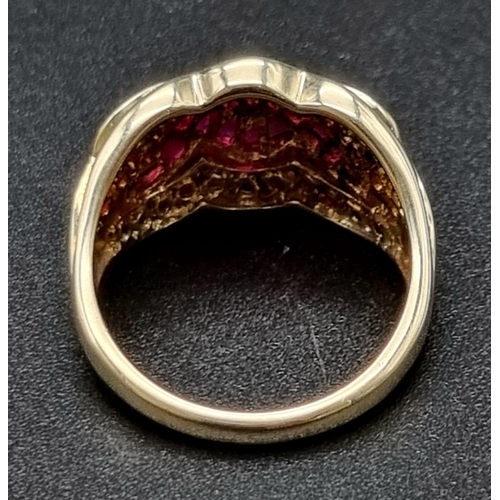 81 - 10K yellow gold ruby set twist ring, size N, total weight 4.9 grams