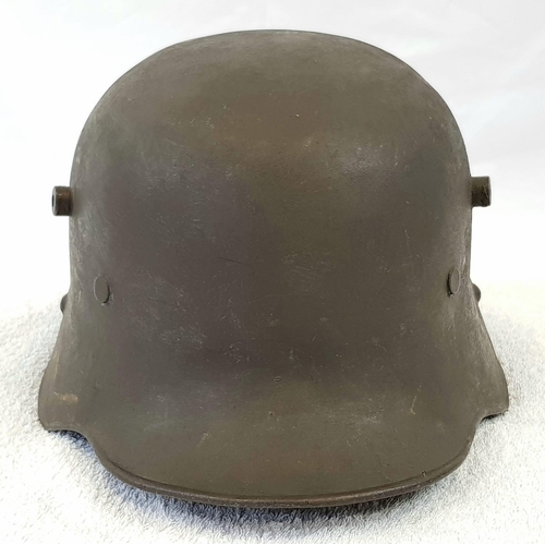 47 - WW1 Austrian M18 Helmet with liner. A nice solid shell with original liner, but has been re-painted
... 