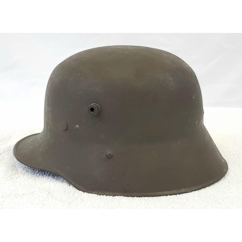 47 - WW1 Austrian M18 Helmet with liner. A nice solid shell with original liner, but has been re-painted
... 