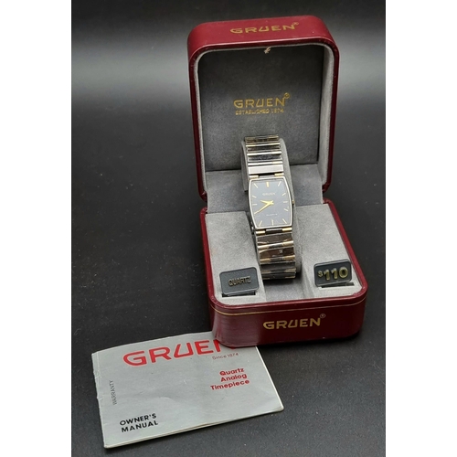 734 - A VINTAGE GRUEN QUARTX WATCH IN ORIGINAL BOX WITH OWNERS MANUAL.