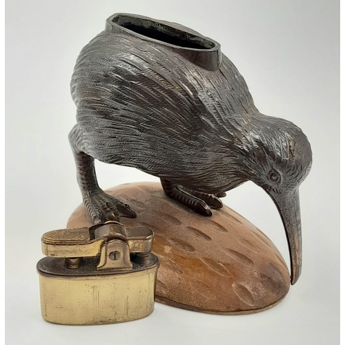 1185 - An Early Rare and Unusual Kiwi Bird Figurine Table Lighter. Patinated metal decoration on a wood bas... 