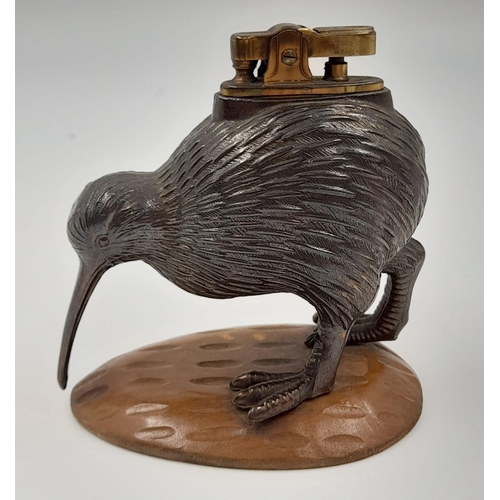 1185 - An Early Rare and Unusual Kiwi Bird Figurine Table Lighter. Patinated metal decoration on a wood bas... 