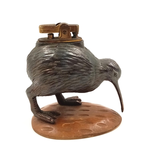 1185 - An Early Rare and Unusual Kiwi Bird Figurine Table Lighter. Patinated metal decoration on a wood bas... 