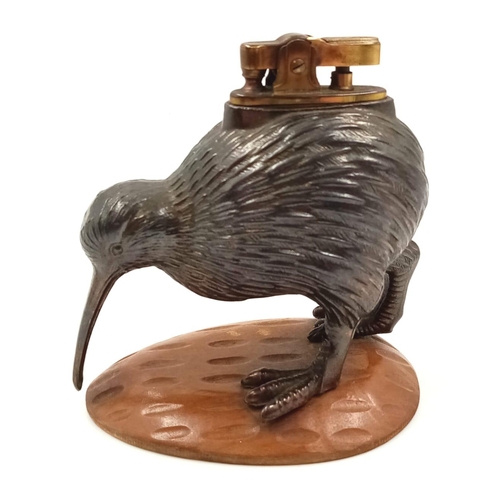 1185 - An Early Rare and Unusual Kiwi Bird Figurine Table Lighter. Patinated metal decoration on a wood bas... 