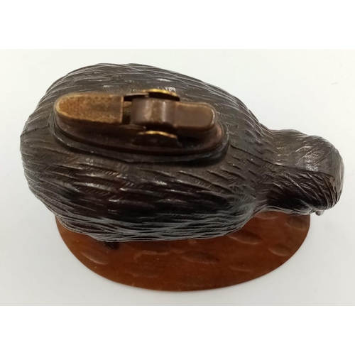 1185 - An Early Rare and Unusual Kiwi Bird Figurine Table Lighter. Patinated metal decoration on a wood bas... 