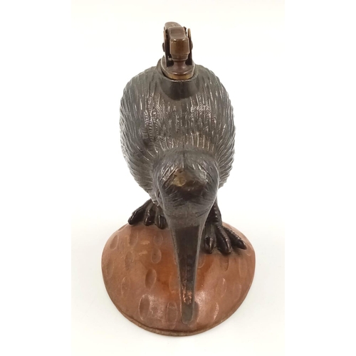 1185 - An Early Rare and Unusual Kiwi Bird Figurine Table Lighter. Patinated metal decoration on a wood bas... 