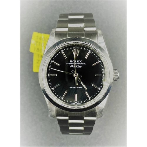 1 - Rolex Oyster Perpetual Air-King Precision watch with black face and white metal strap, 2008 
Comes w... 