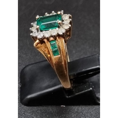 763 - A 10K Yellow Gold Green and White Stone Ring.
Size M. 3.5g - Plus two yellow metal and colourful sto... 