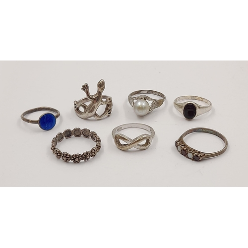 1193 - An Eclectic Mix of Seven Vintage Silver Rings. 17.3g