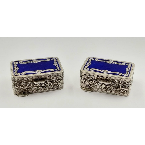 36 - A nice pair of sterling silver and enamel pill boxes. Beautifully engraved, with no damages or repai... 