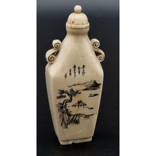 29 - A 19th Century, carved ivory snuff bottle from the Orient. Unusual shape, good engraving and calligr... 