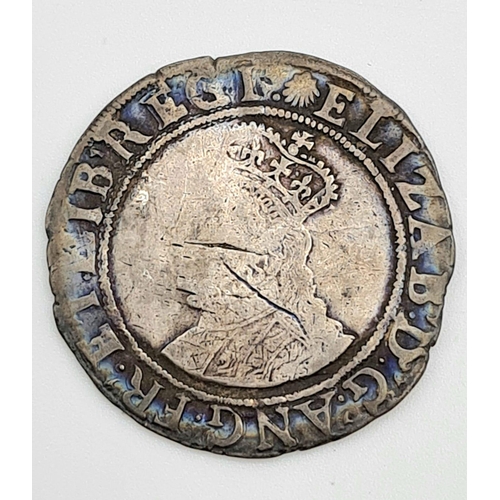 550 - An Ancient Elizabeth I Hammered Silver Shilling. 1558 - 1603. Please see photos for conditions. A/F.... 