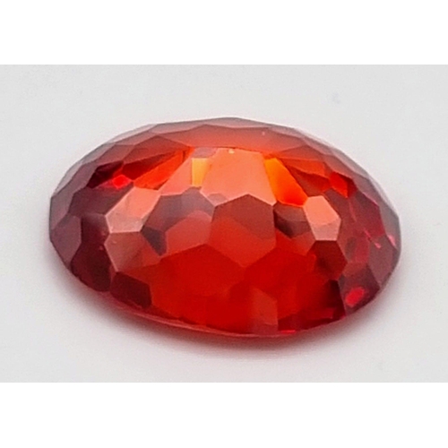 210 - An amazing, large (88.9 carats) natural zircon in vivid orange hues. Oval cut, not colour enhanced, ... 