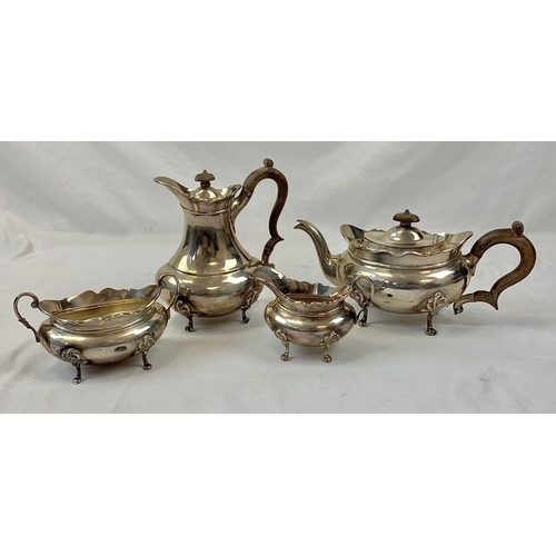 45 - An Antique Four-Piece James Weir Tea Set. Hallmarks for Glasgow 1921. To Include: Tea Pot (wood hand... 