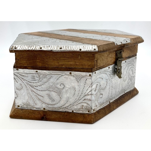 196 - Three Tibetan silver and wood boxes. Dimensions of largest box: 28 x 19 x 11 cm. No damages.