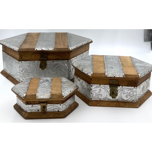 196 - Three Tibetan silver and wood boxes. Dimensions of largest box: 28 x 19 x 11 cm. No damages.