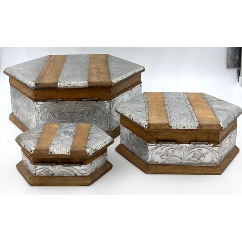 196 - Three Tibetan silver and wood boxes. Dimensions of largest box: 28 x 19 x 11 cm. No damages.