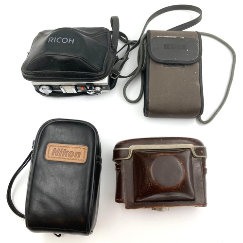 463 - 4 VINTAGE CAMERAS TO INCLUDE A NIKON ZOOM 310, A RICOH 500GX , A BRAUN SUPER PAXETTE AND ANOTHER RIC... 