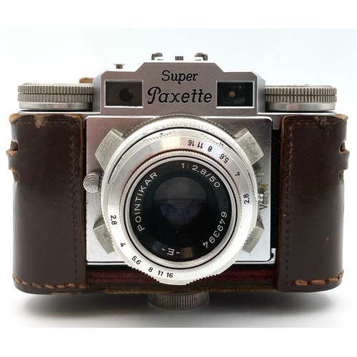 463 - 4 VINTAGE CAMERAS TO INCLUDE A NIKON ZOOM 310, A RICOH 500GX , A BRAUN SUPER PAXETTE AND ANOTHER RIC... 