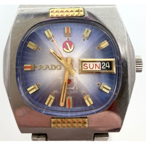 110 - A Vintage Rado Musketeer IV Gents Watch. Stainless steel strap and case - 36cm. Blue dial with day d... 