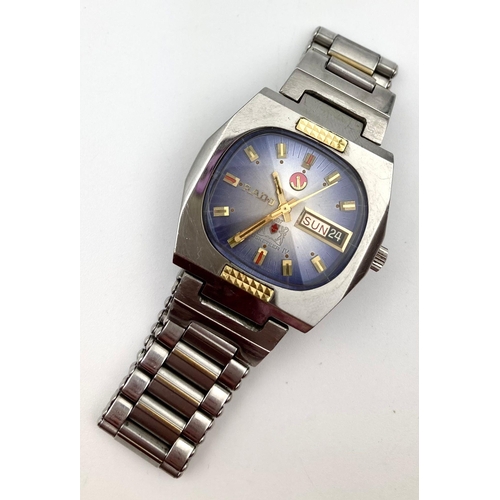 110 - A Vintage Rado Musketeer IV Gents Watch. Stainless steel strap and case - 36cm. Blue dial with day d... 