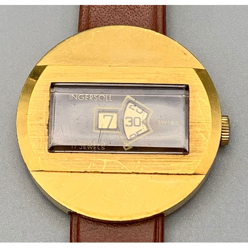 115 - A Rare Vintage Ingersoll Jumping Hour Gents Watch. Mechanical self wind movement. Leather strap. Two... 