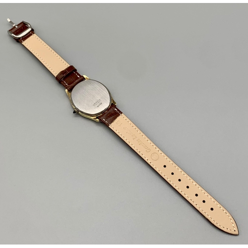 536 - A Vintage Raymond Weil Oval Unisex Watch. Leather strap. Two tone case - 32mm. Multi-green coloured ... 