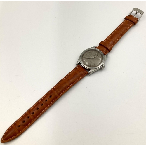 25 - A Vintage Rolex Royal 6144 Mechanical Watch. Leather strap. Stainless steel case - 32mm. Dial is sli... 